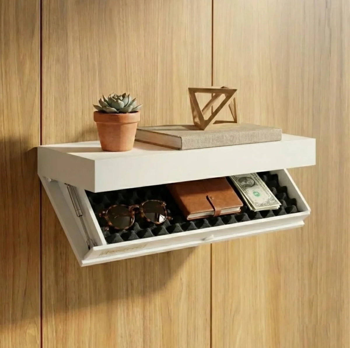 Hidden. shelf in White on a timber wall, foam-lined compartment open